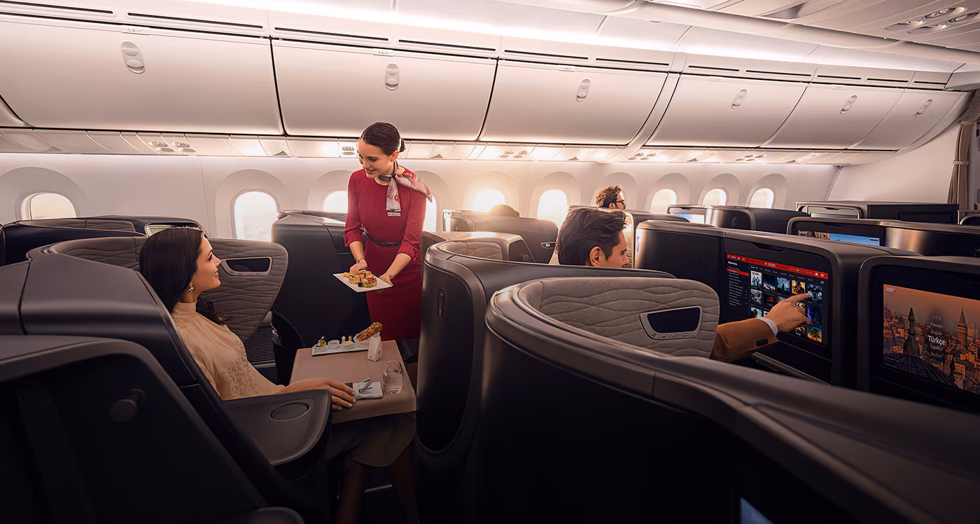 Hostess who started the dining on board service in THY Business Class cabin